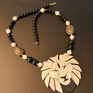 Elegant Black and White Beaded Lion Necklace